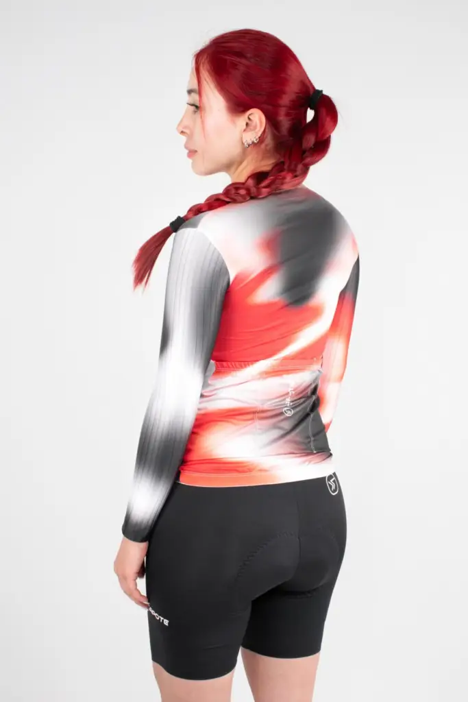 6. JERSEY DE CICLISMO NEBULA INFERNO – CAPOTE – MANGA LARGA – MUJER – ESPALDA